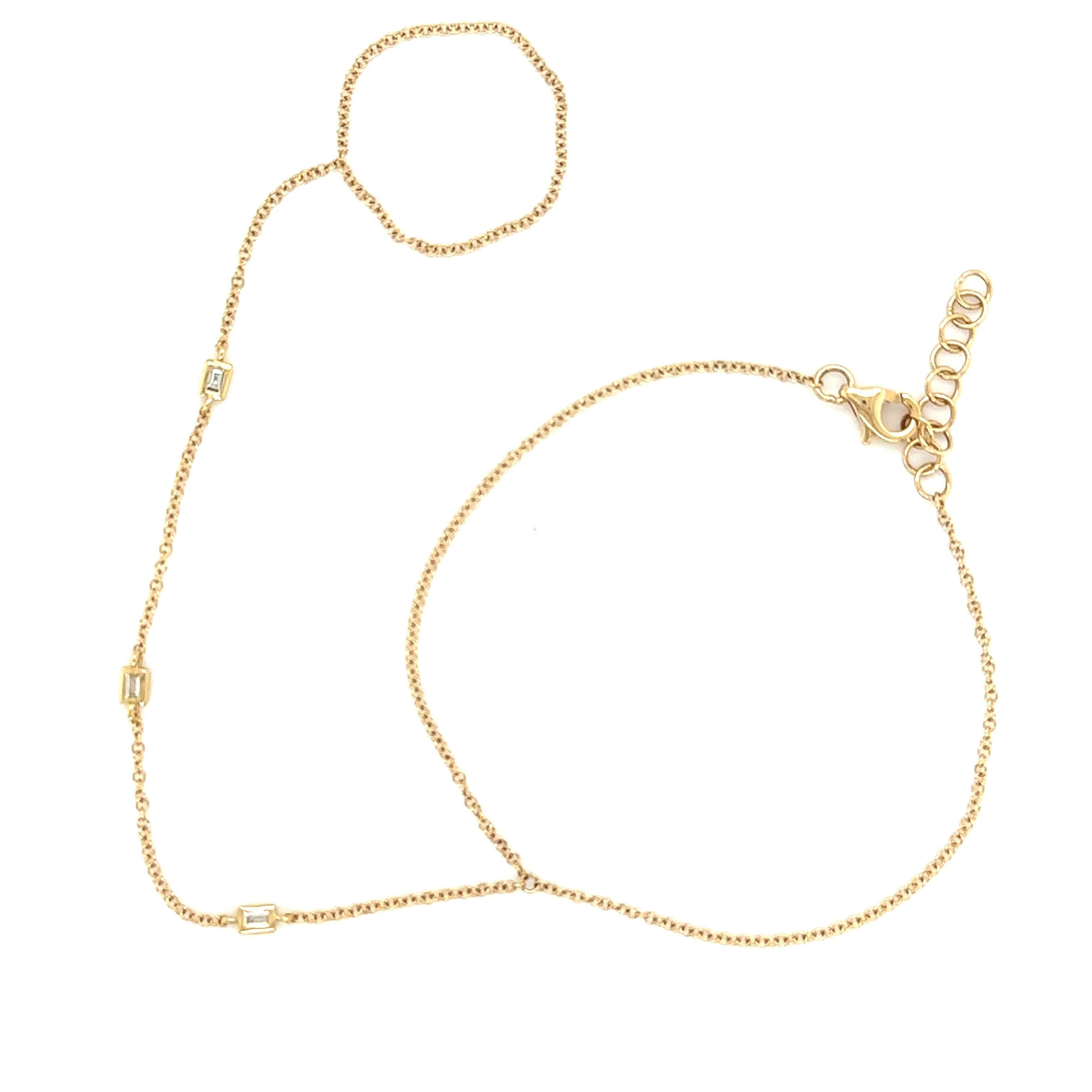 Delicate gold anklet with adjustable loops and small rectangular charms from our jewelry collection.