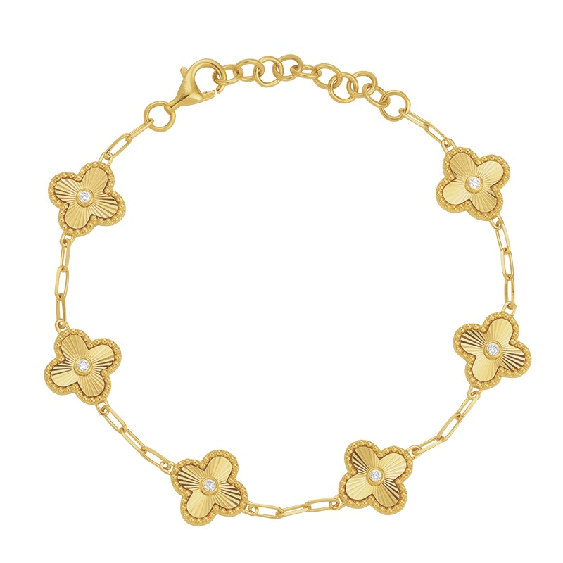 Elegant gold bracelet with floral design and pearl accents, exquisite jewelry piece by our brand, perfect for enhancing any outfit.