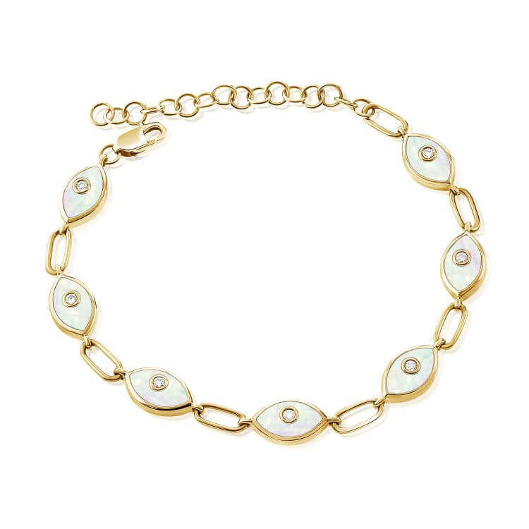 Gold bracelet with oval white gemstones from our luxury jewelry collection