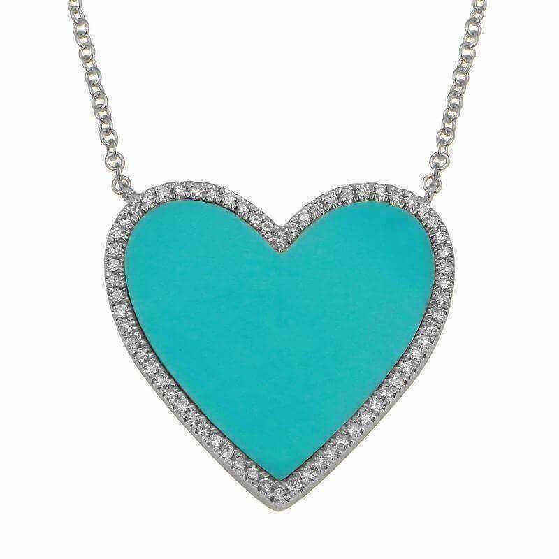 Heart-shaped turquoise pendant with diamond accents on silver chain necklace from our exclusive jewelry collection.