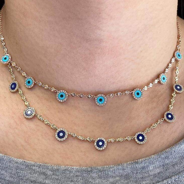 Elegant layered necklace with blue and turquoise evil eye pendants from our jewelry brand, adding sophistication to any outfit