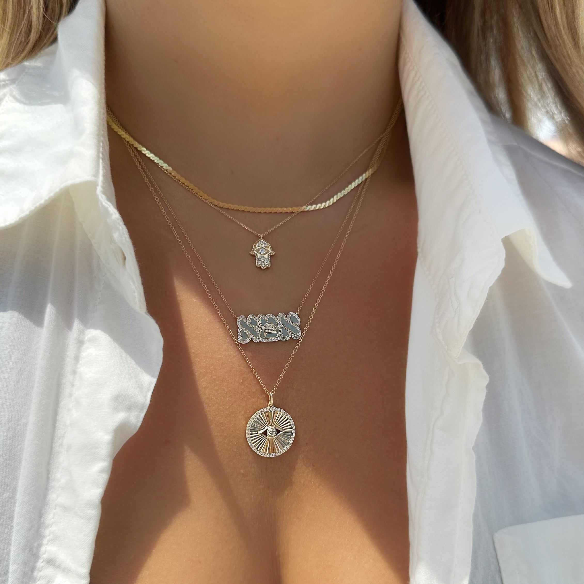 Diamond Halo Radiating Evil Eye Necklace close-up, halo