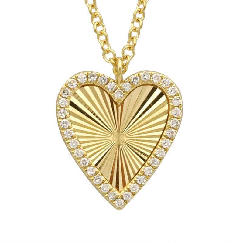 Stunning gold heart pendant necklace with diamond accents, perfect for adding a touch of elegance to any outfit.