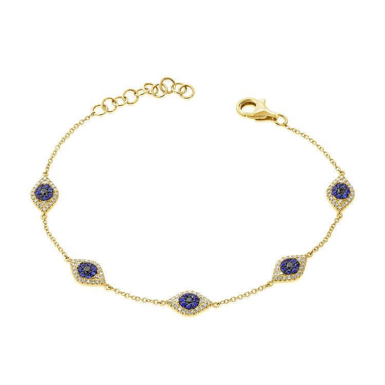 Gold bracelet with blue gemstone accents from our jewelry brand
