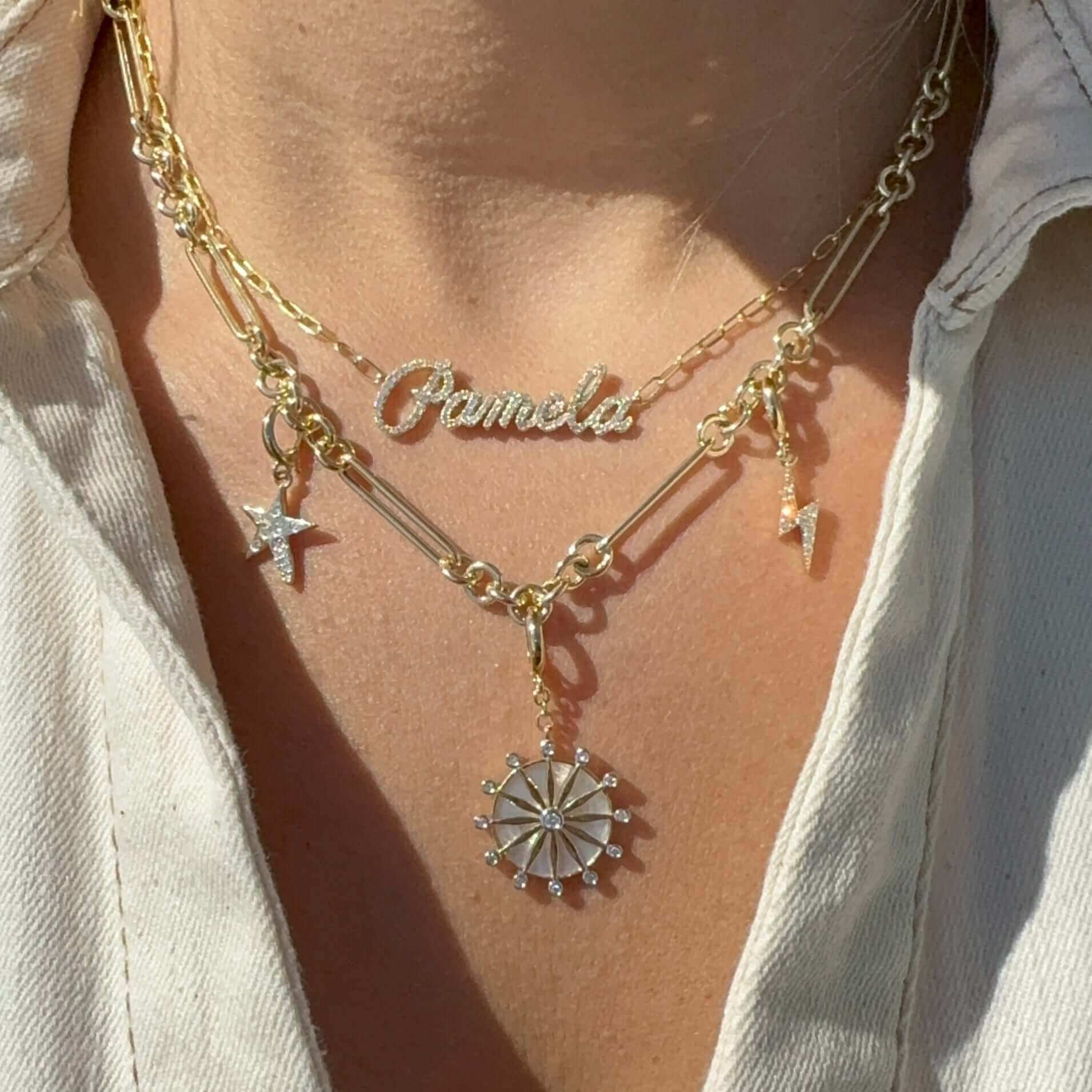 14K Gold Mixed Clip Link Chain Necklace with charms, showcasing layered design and elegance.