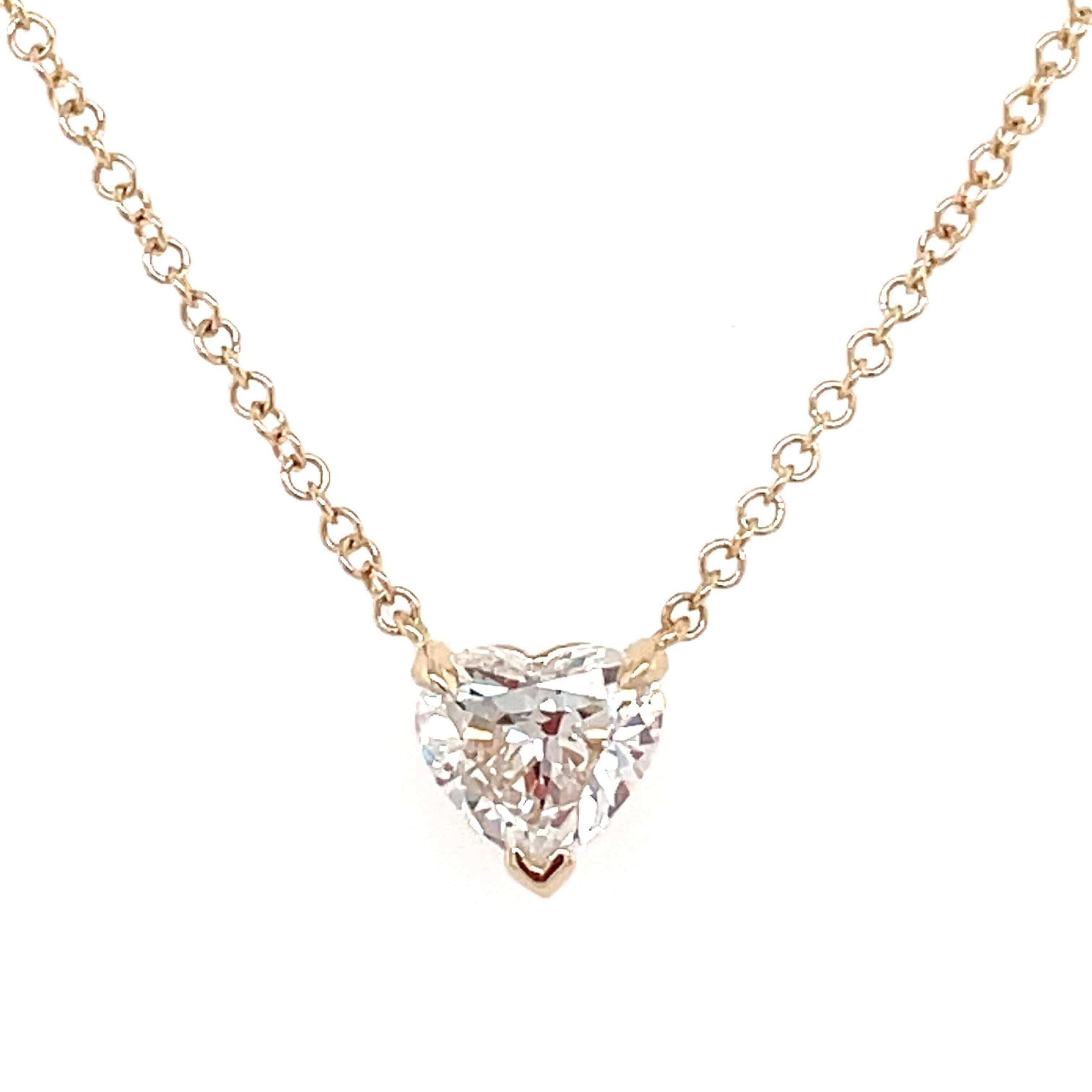 14K gold Floating Solitaire Necklace Setting featuring a heart-shaped diamond centerpiece from Izakov Fine Jewelry.