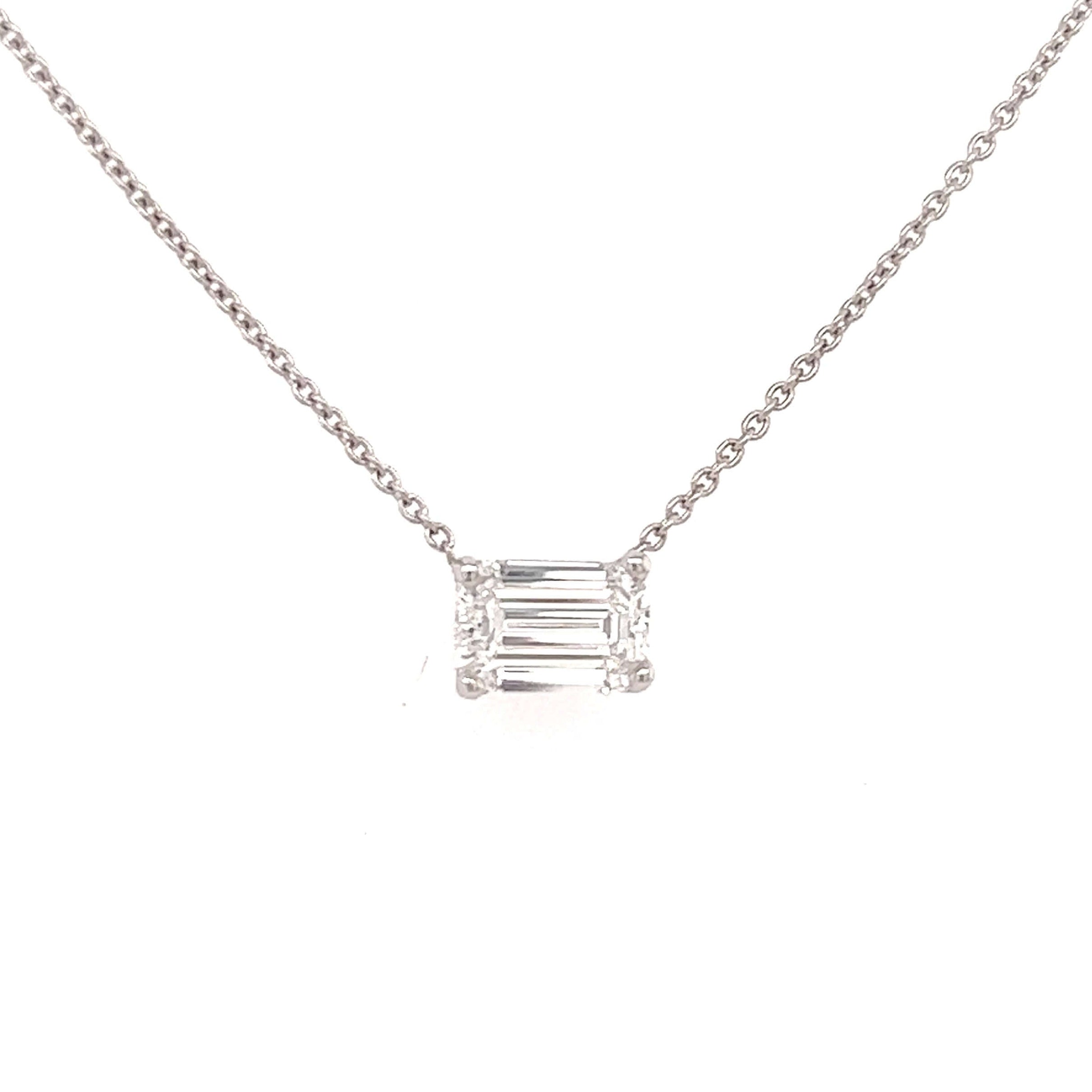 14K Gold Floating Solitaire Lab-Grown Diamond Necklace featuring an emerald-cut diamond on a delicate chain.