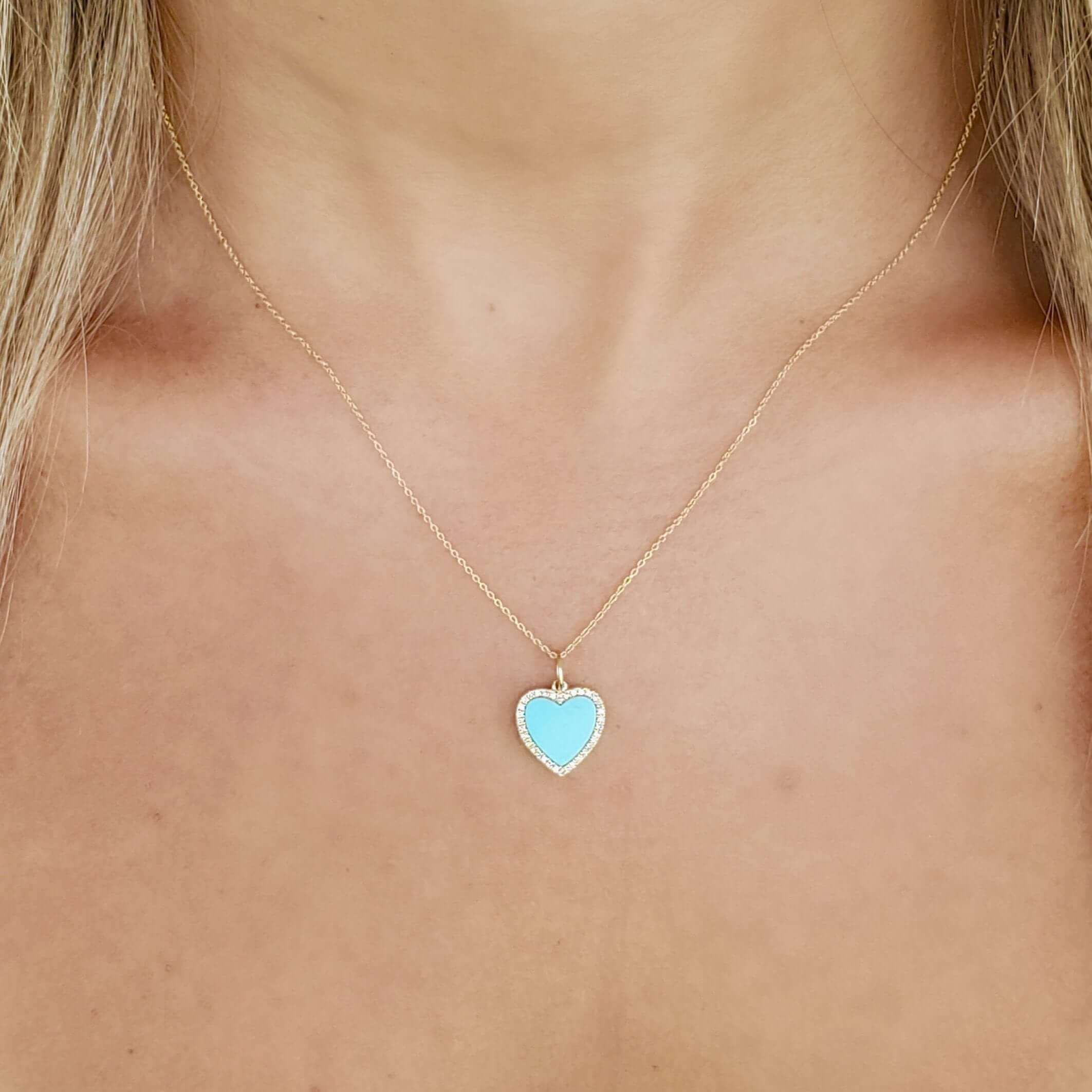 Gold necklace with turquoise heart pendant by our jewelry brand