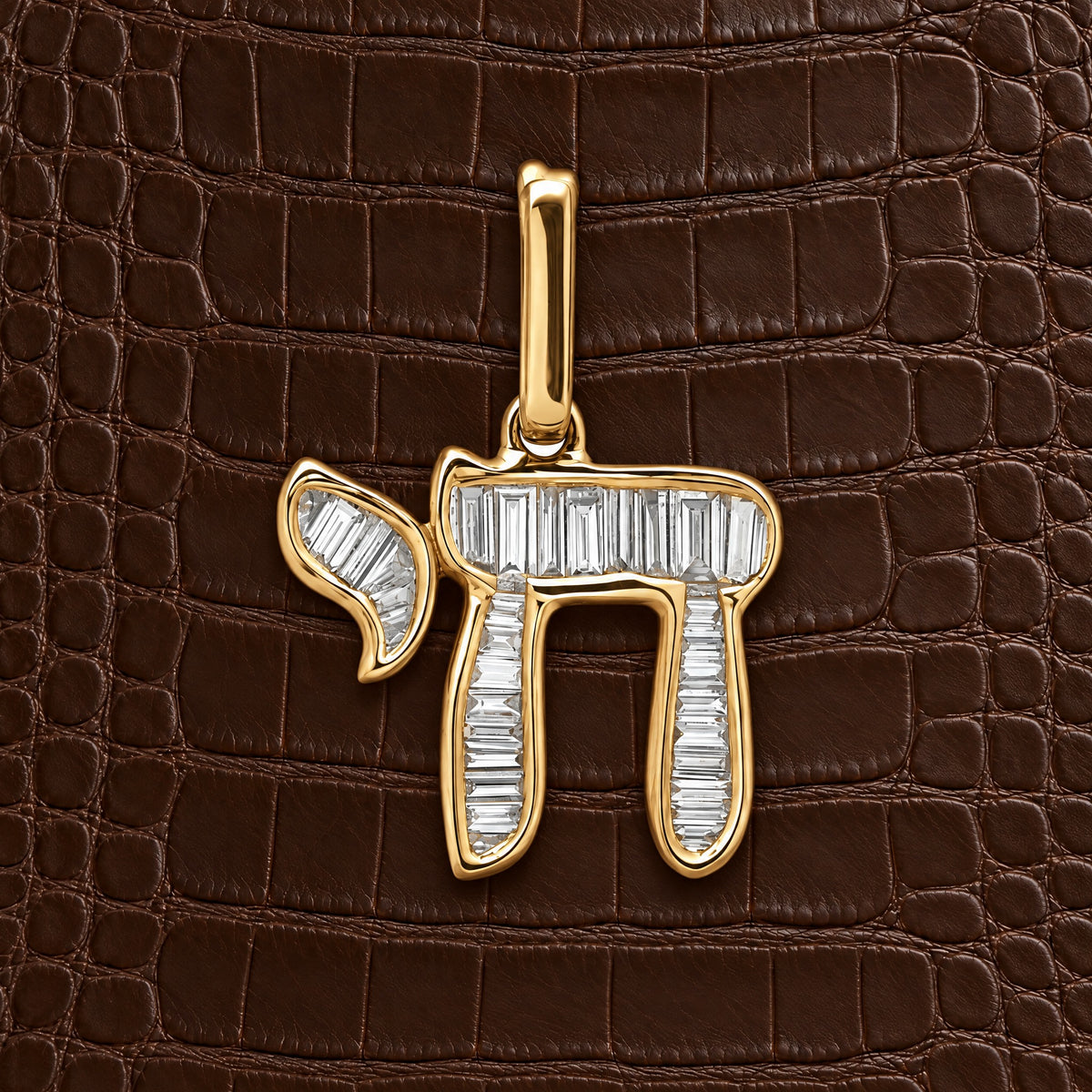 Hebrew Chai Baguette Diamond Necklace Charm in 14K yellow gold, styled, Izakov Fine Jewelry
