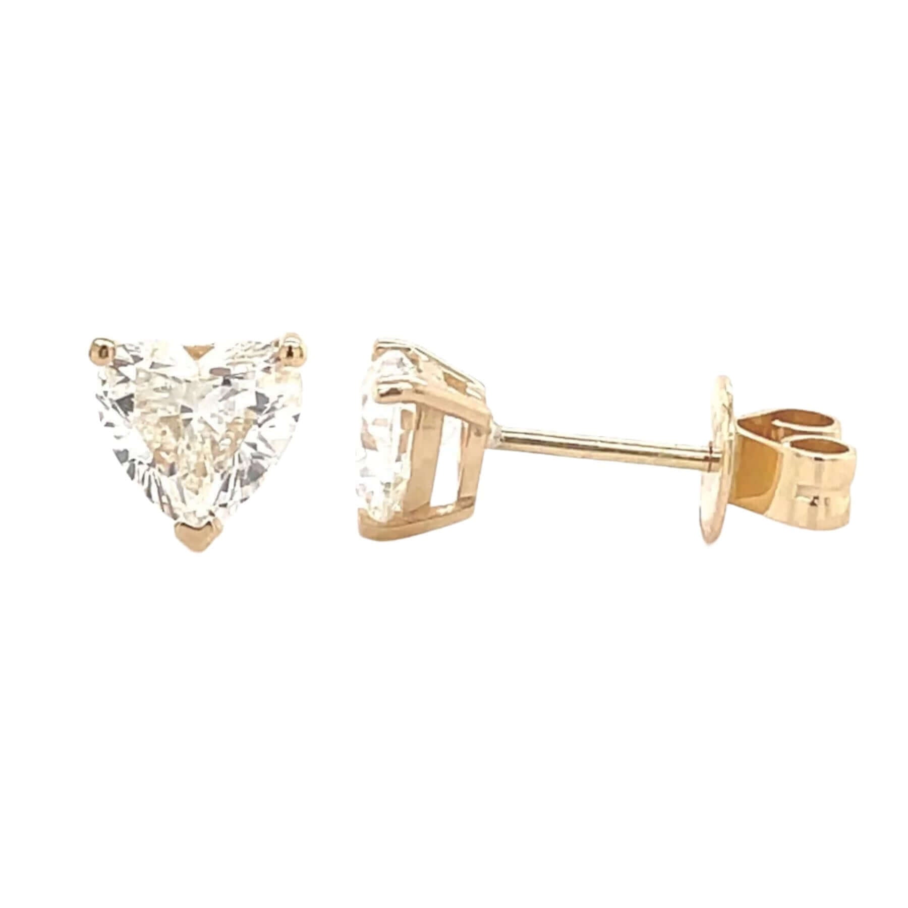 14K gold heart-shaped diamond stud earrings with lab-grown diamonds, showcasing elegance and eco-friendliness.