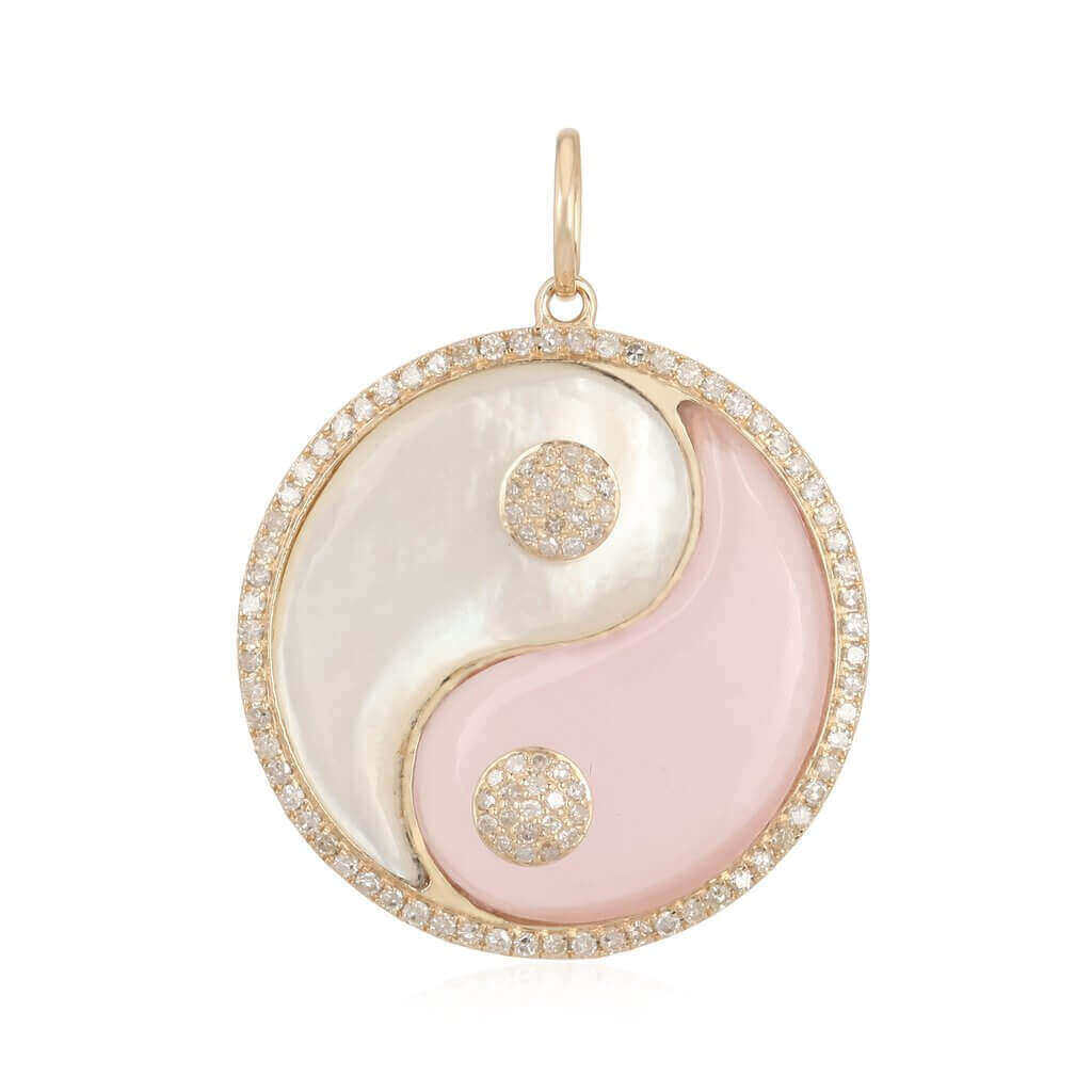Elegant yin yang pendant with diamonds and pink and white enamel, showcasing the exquisite craftsmanship of our jewelry brand.