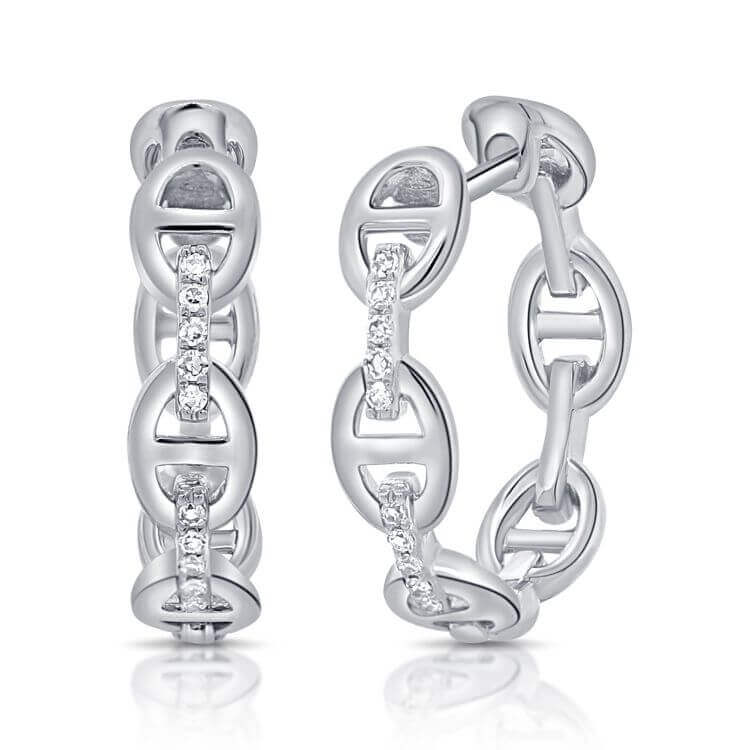 Elegant silver hoop earrings with intricate design and sparkling diamonds from our exclusive jewelry collection