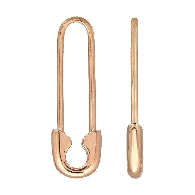 Gold safety pin shaped earrings from our jewelry collection. Simple and elegant design perfect for any occasion.