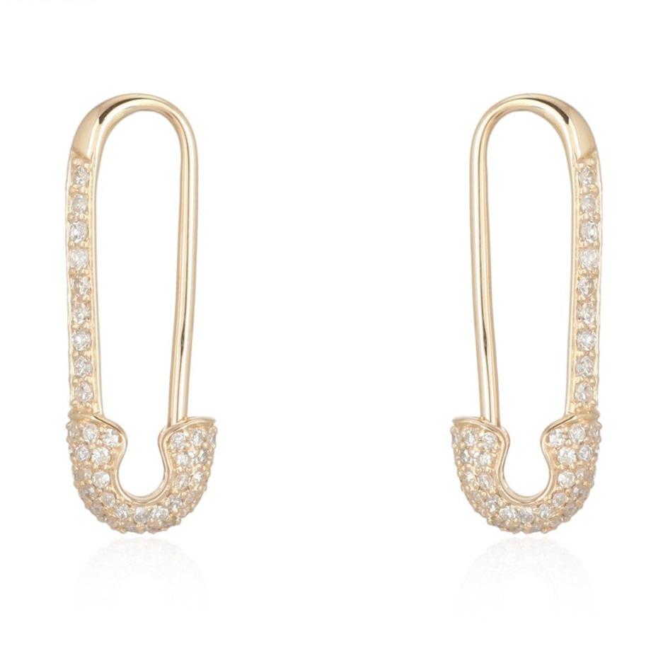 Elegant gold earrings with diamond accents - stylish jewelry for your sophisticated look.