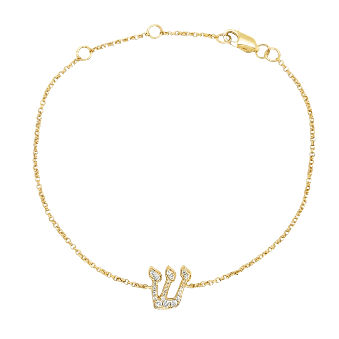 Elegant gold bracelet with trident-shaped charm encrusted with diamonds from our luxury jewelry collection.