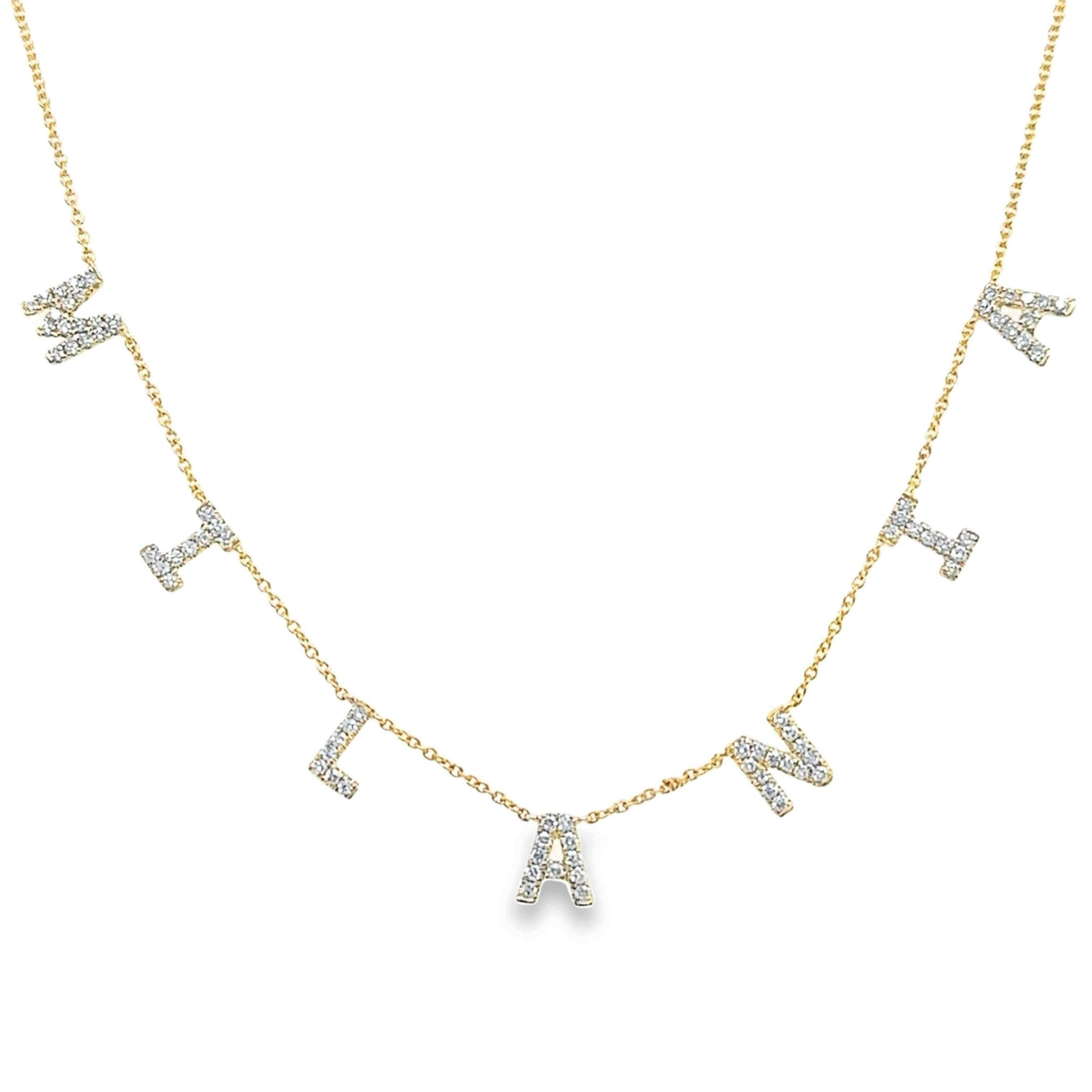 Gold necklace with sparkling letter charms from our jewelry brand
