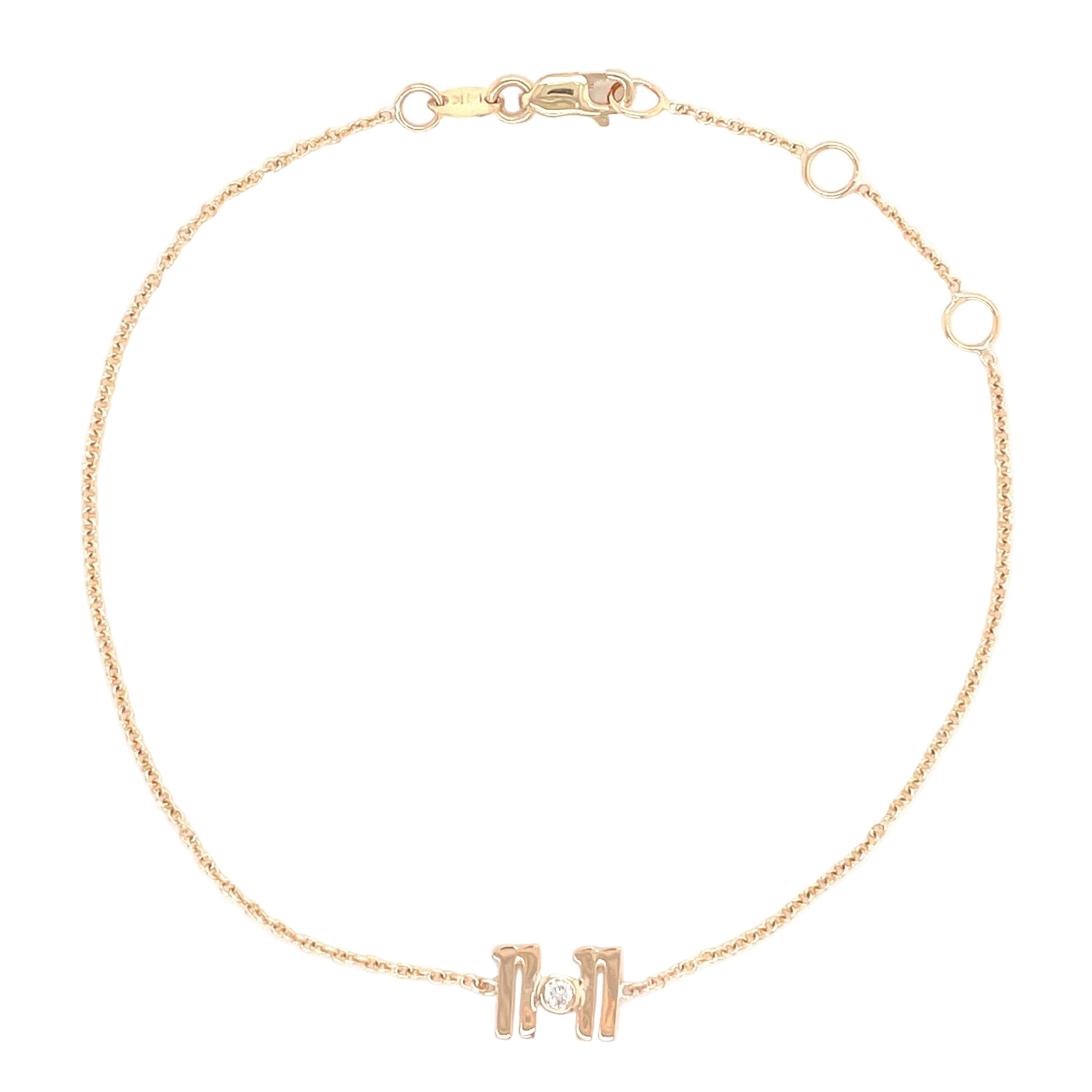 Delicate gold bracelet with a single sparkling diamond centerpiece from our exclusive jewelry collection.