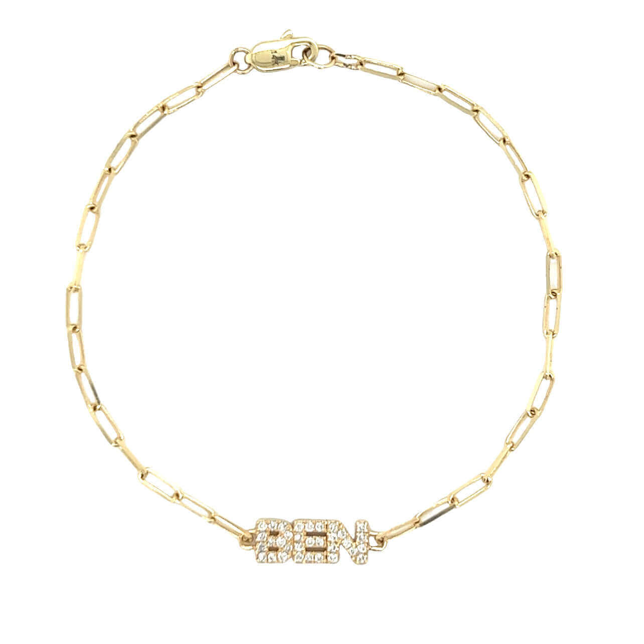 Gold chain bracelet with diamond-studded "Ben" pendant from luxury jewelry brand.