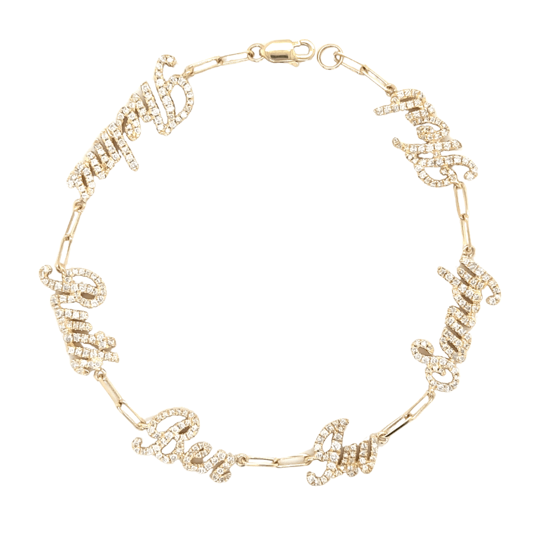 Gold bracelet with sparkling name charms from luxury jewelry brand.