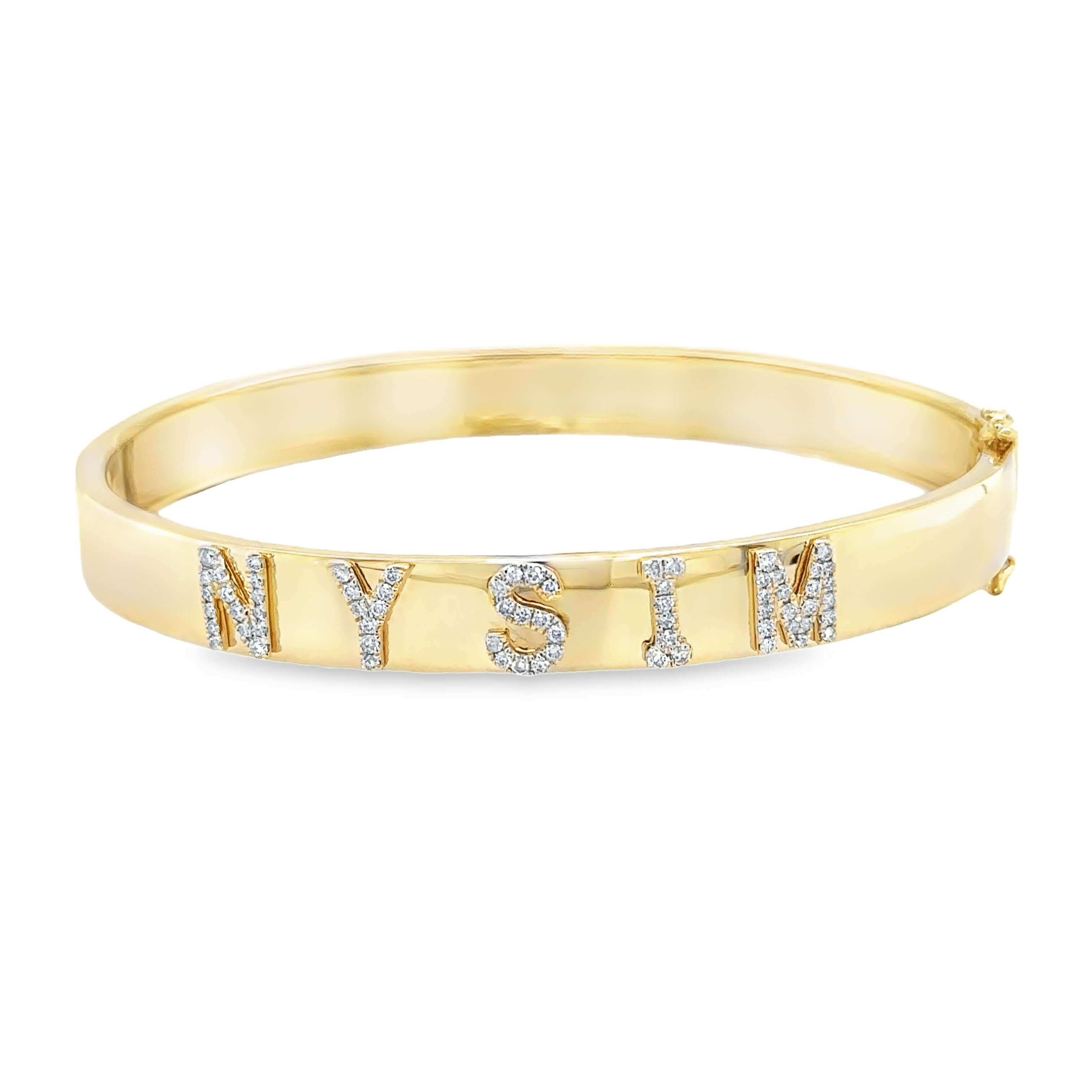 Elegant gold bracelet with sparkling "NYSIM" lettering from our jewelry brand collection.