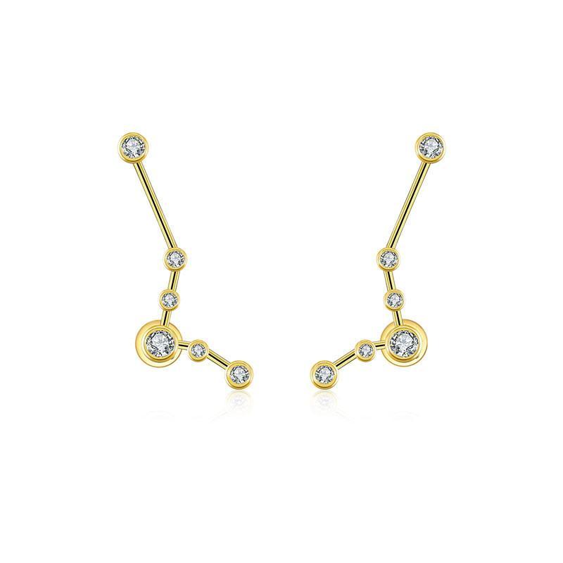 18K gold zodiac constellation diamond earrings showcasing unique celestial designs with sparkling diamonds.