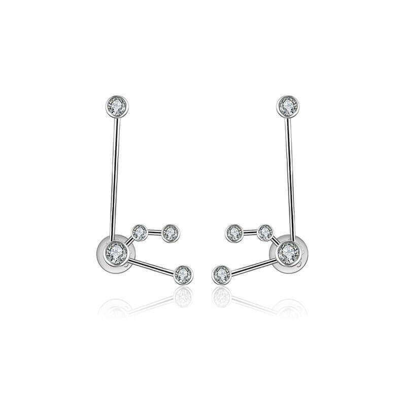 18K gold zodiac constellation diamond earrings showcasing celestial designs and sparkling diamonds.