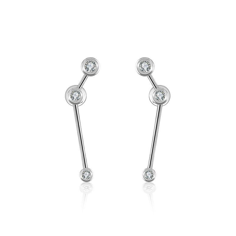 18K gold zodiac constellation diamond earrings featuring sparkling diamonds in celestial designs.