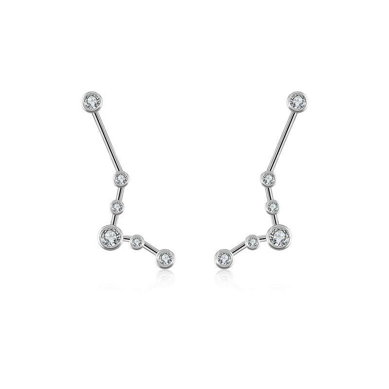 18K gold zodiac constellation diamond earrings featuring sparkling diamonds in celestial designs.