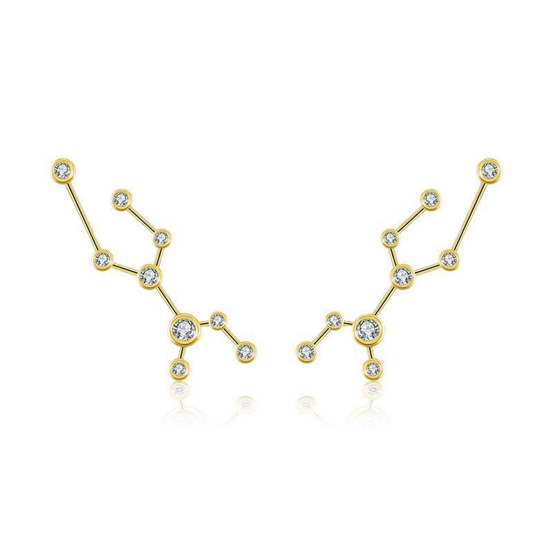 18K gold zodiac constellation diamond earrings showcasing intricate celestial designs with sparkling diamonds.