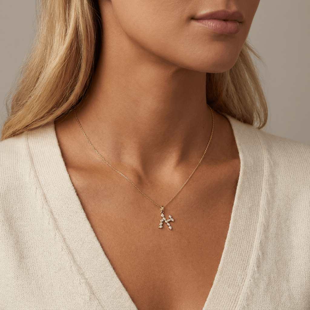 Multi Shape Hebrew Diamond Initial Pendant © worn by a model, showcasing the intricate diamond arrangement and elegant design.