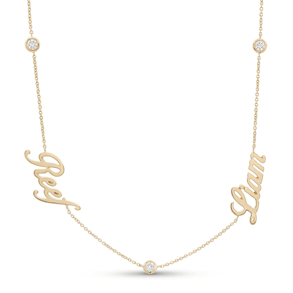 Multiple Name Diamond Bezels Station Necklace with custom names and diamond accents in 14K gold.
