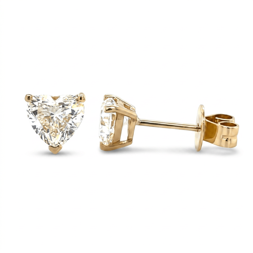 Lab-Grown Heart Shaped Diamond Stud Earrings in 14K Gold with VVS-VS clarity.