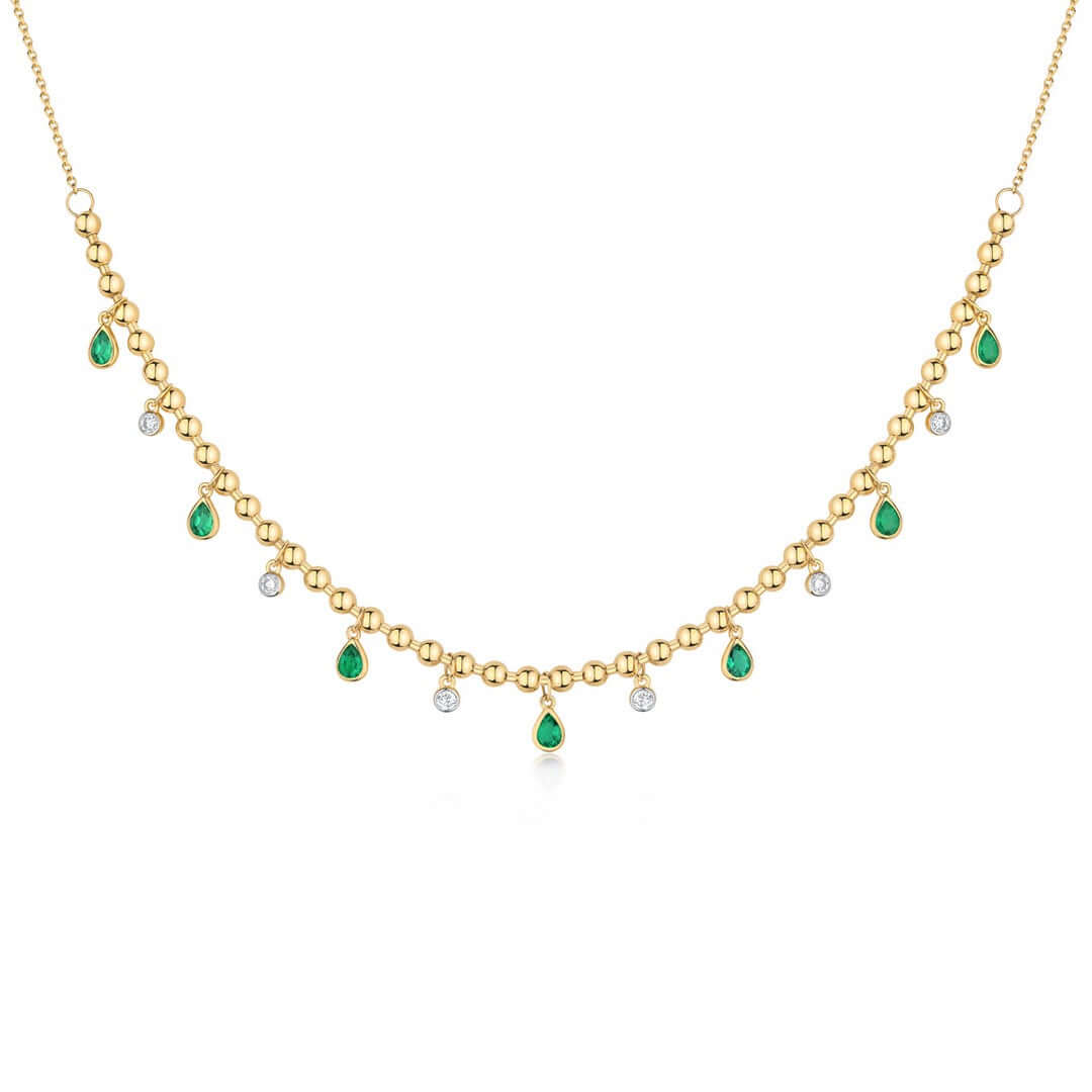 14K Gold Drop Pear Gemstone Bezel Ball Chain Diamond Necklace featuring emerald and diamond accents on a delicate chain.