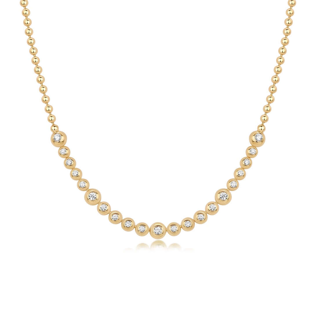14K Gold Bezel Set Diamond Ball Beaded Necklace featuring 21 diamond bezels set in gold with alternating sizes.