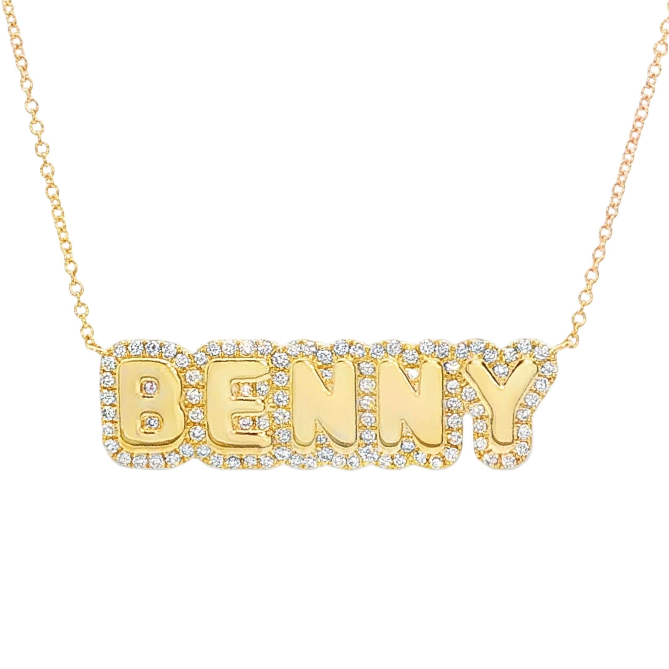 Gold necklace with 'BENNY' pendant on a white background