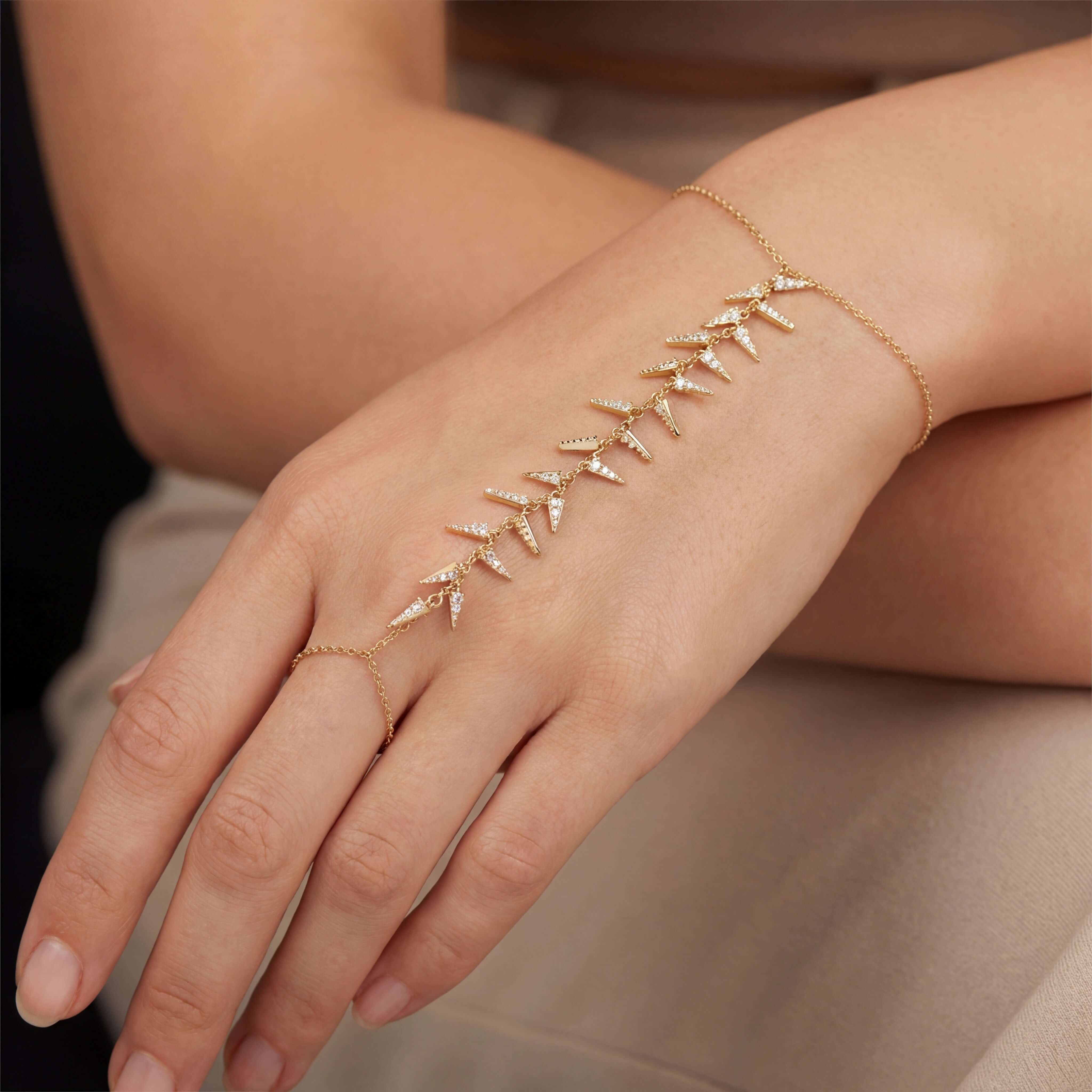 Diamond Shaker Hand Chain showcasing brilliant diamonds in a micro pavé design on a hand for elegant style.