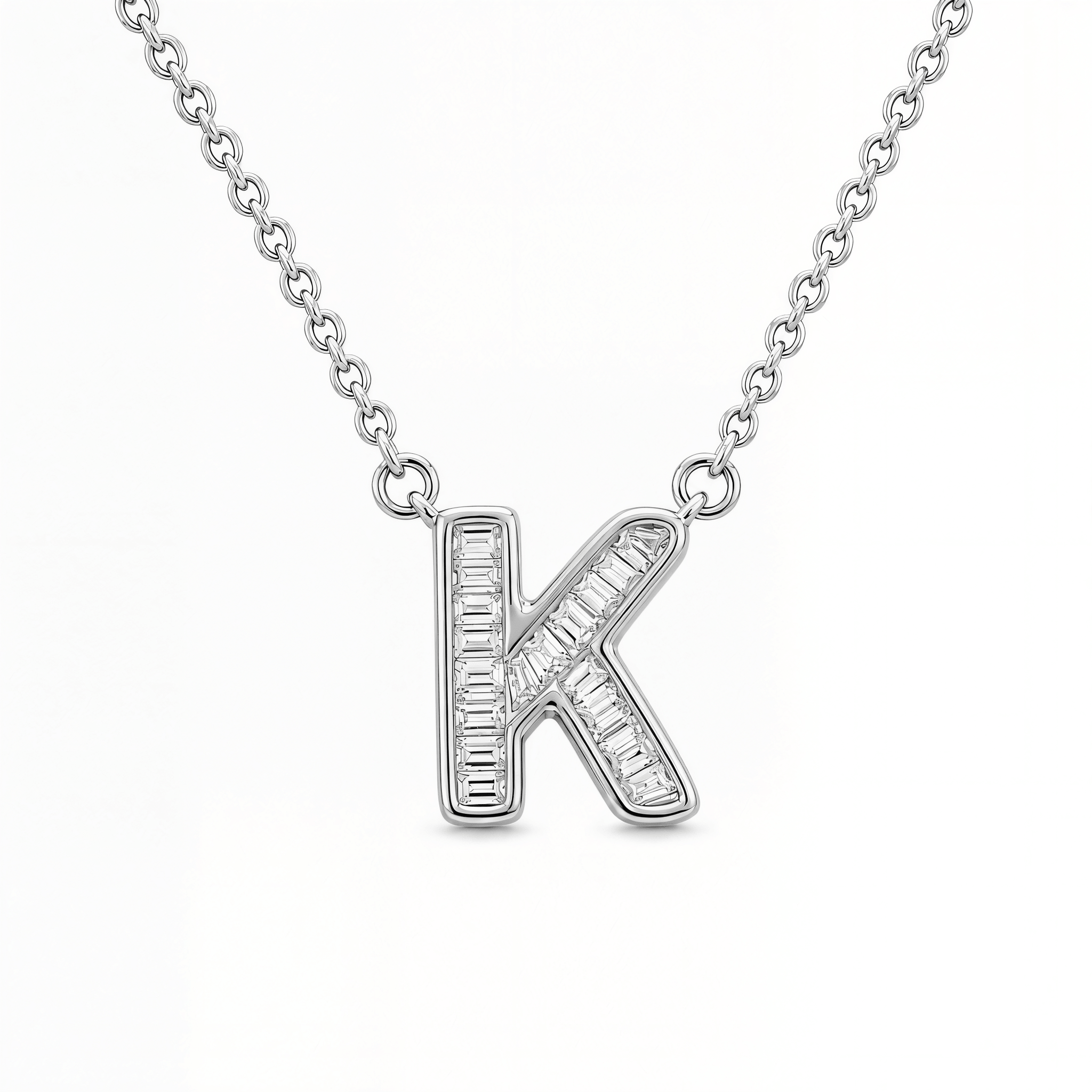 Baguette Diamond Letter Necklace featuring a 'K' pendant in silver with channel-set diamonds.
