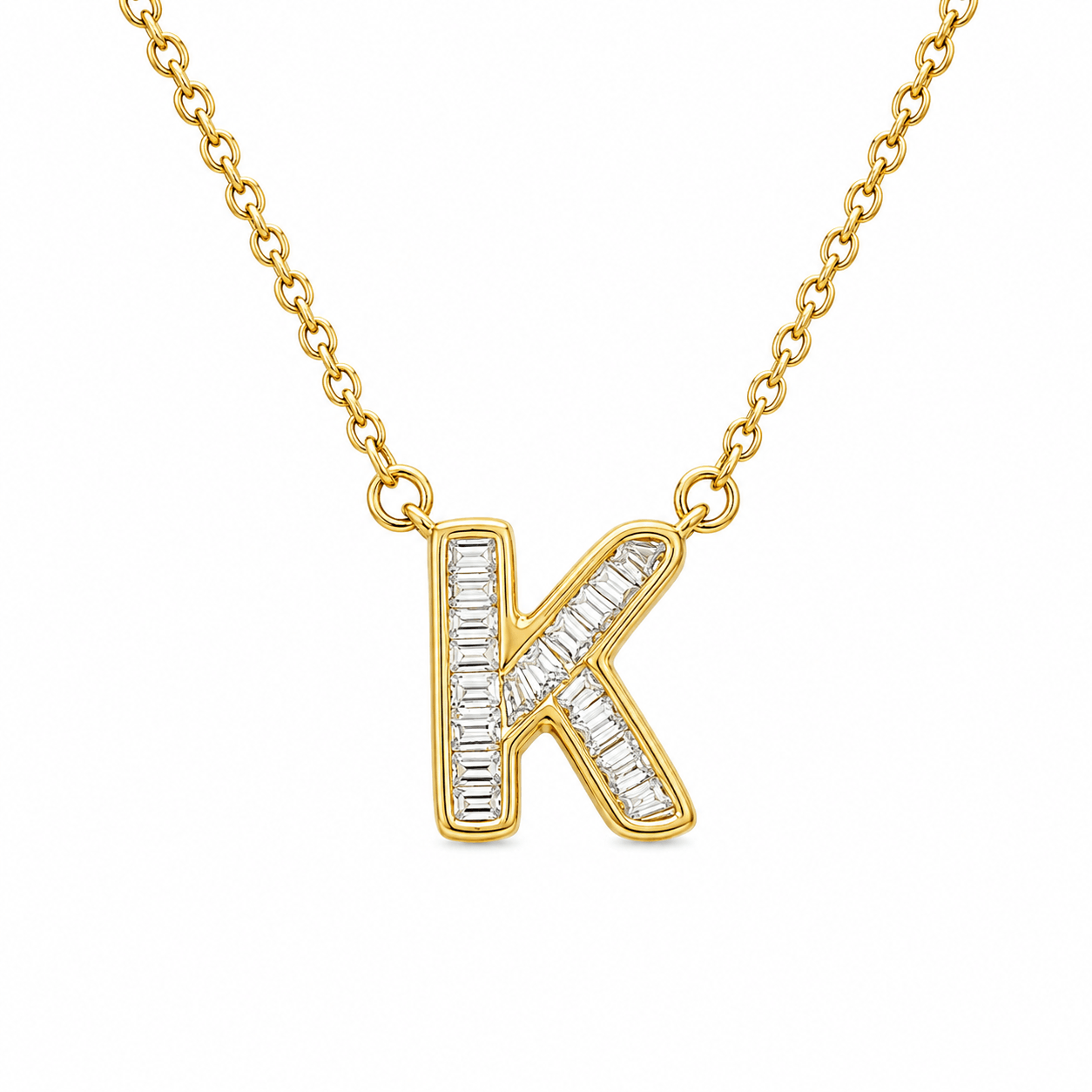 Baguette Diamond Letter Necklace featuring a gold chain with a diamond-encrusted letter 'K' pendant.