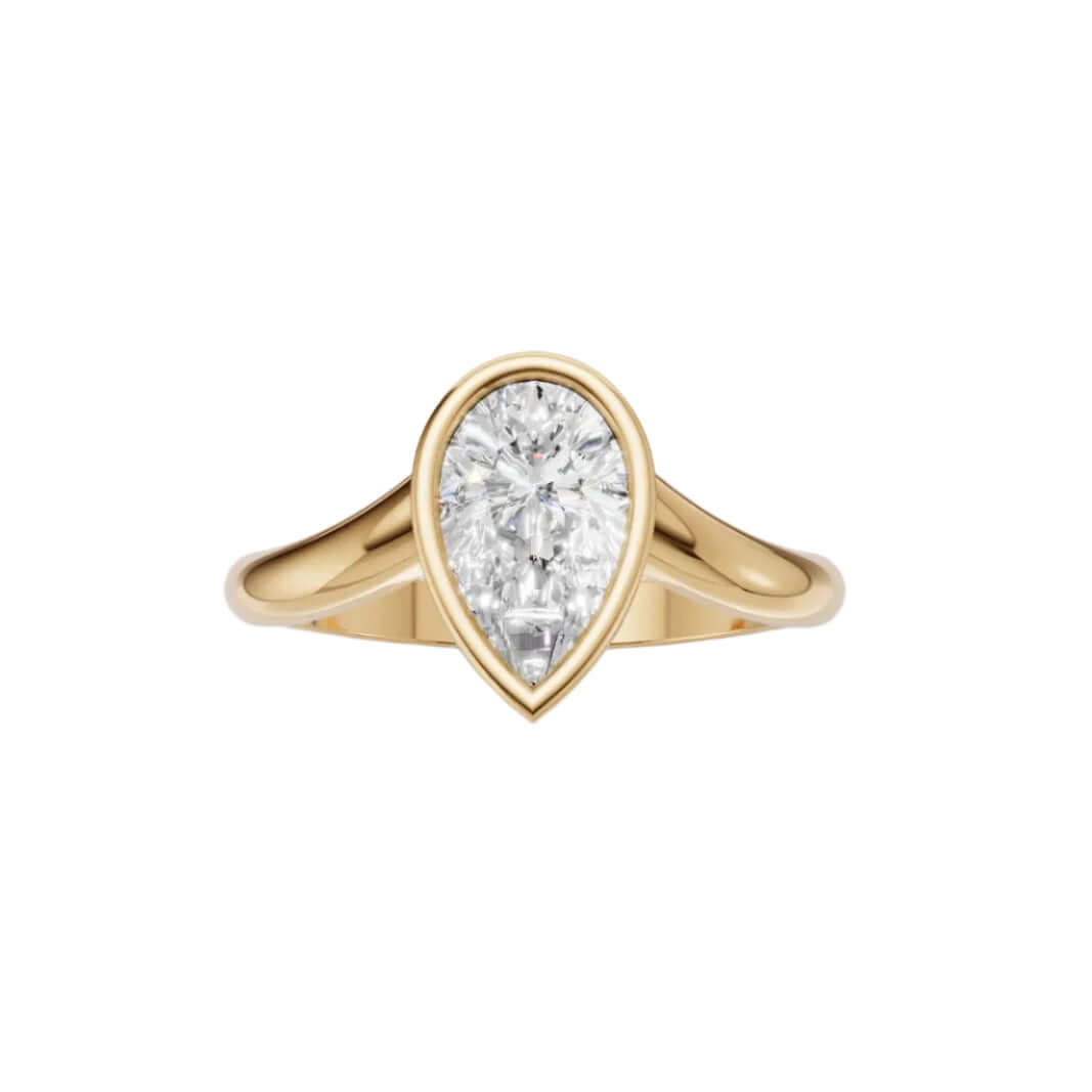 Curved Lab Diamond Bezel Ring featuring a stunning pear-shaped lab diamond in a 14k gold setting.