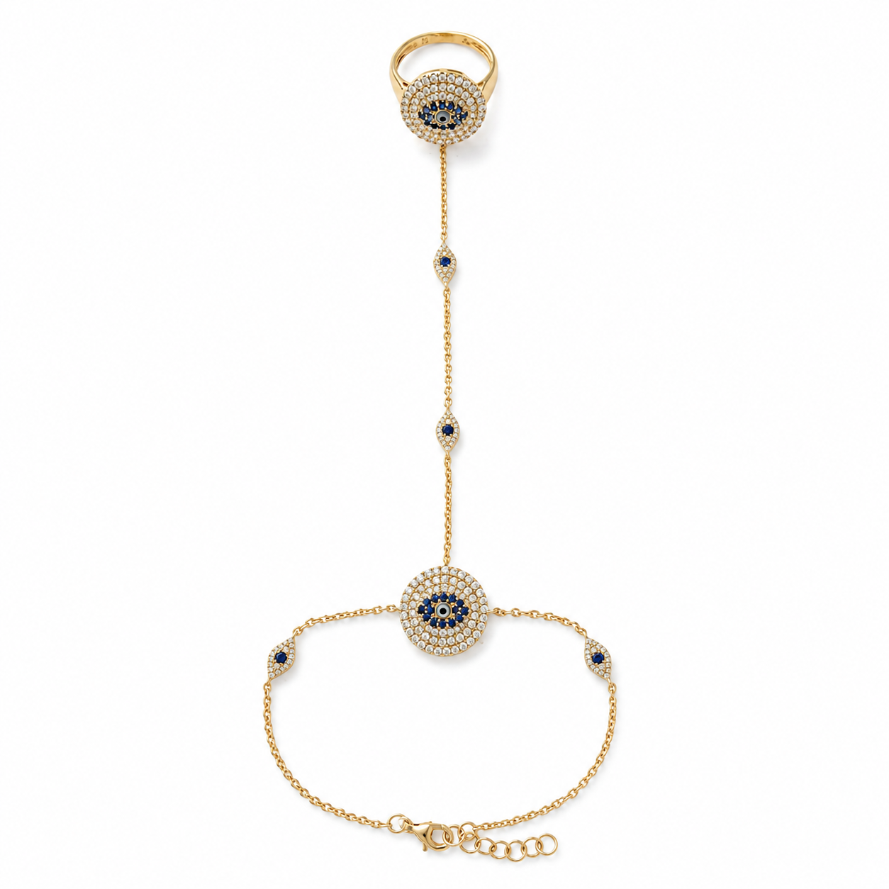The Grand Evil Eyes Diamond Hand Chain in 14k gold, with round and marquise-shaped pavé diamond and sapphire evil eye motifs.