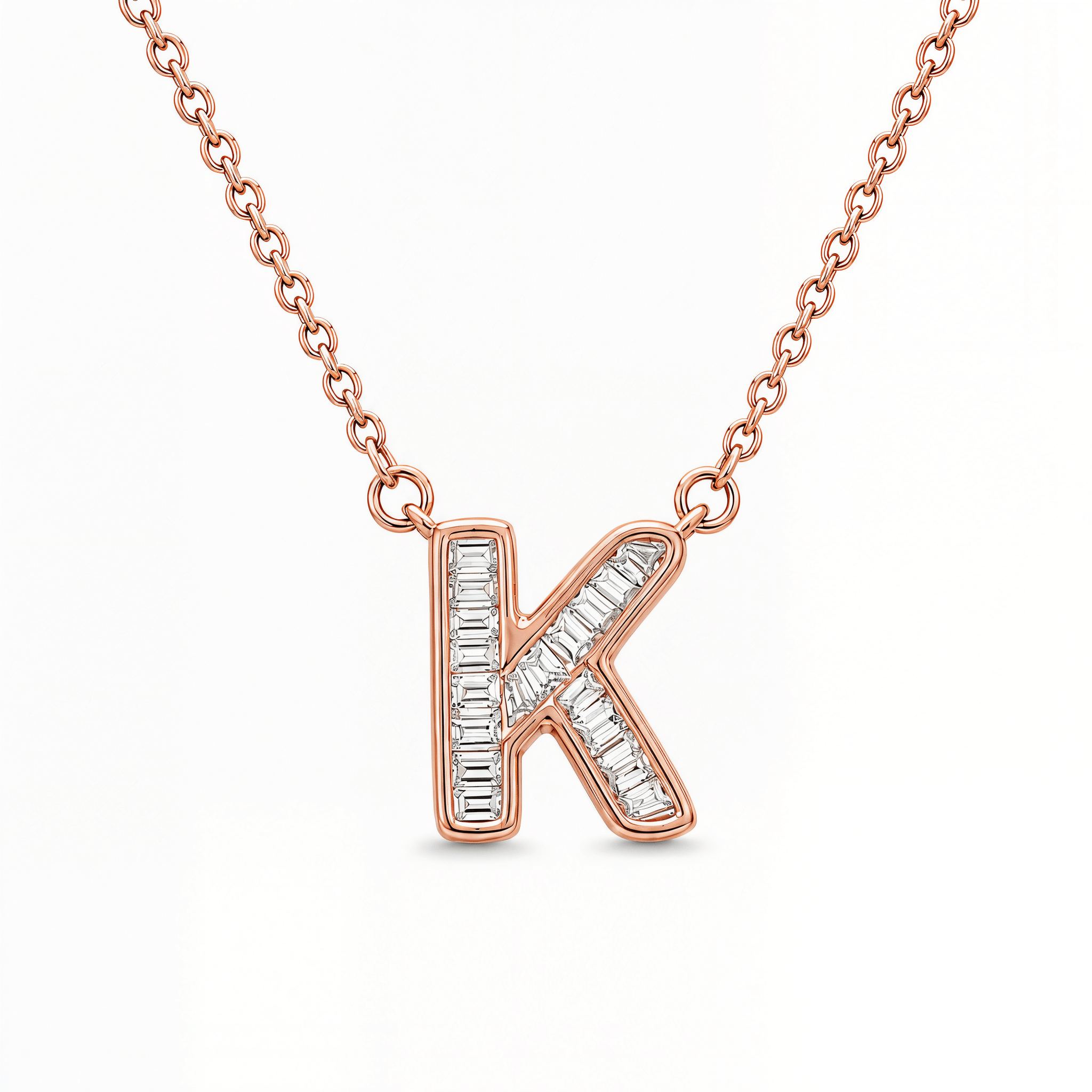 Baguette Diamond Letter Necklace featuring a rose gold 'K' pendant with channel-set diamonds.