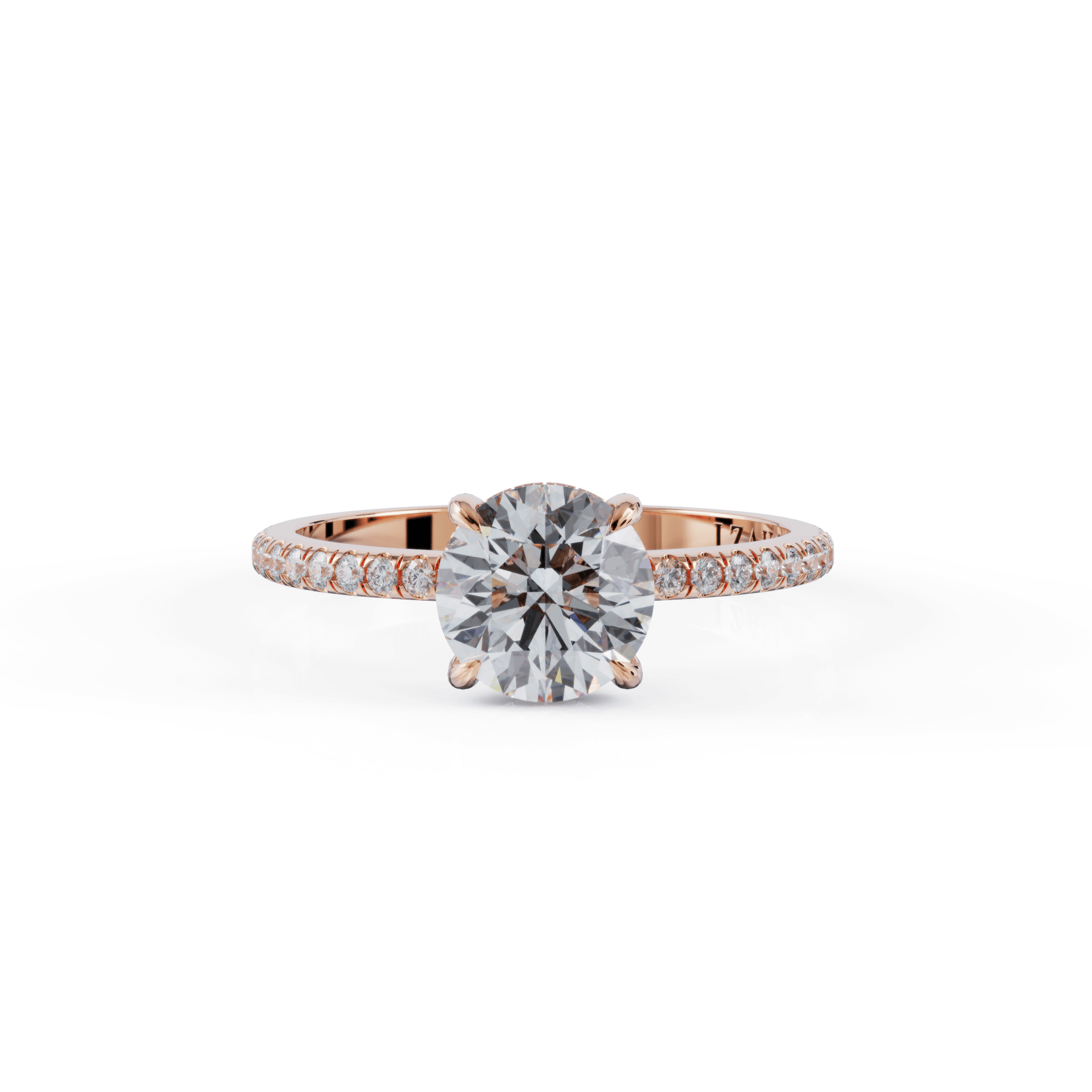 Rose gold engagement ring with round diamond center stone and pavé band from our luxury jewelry collection