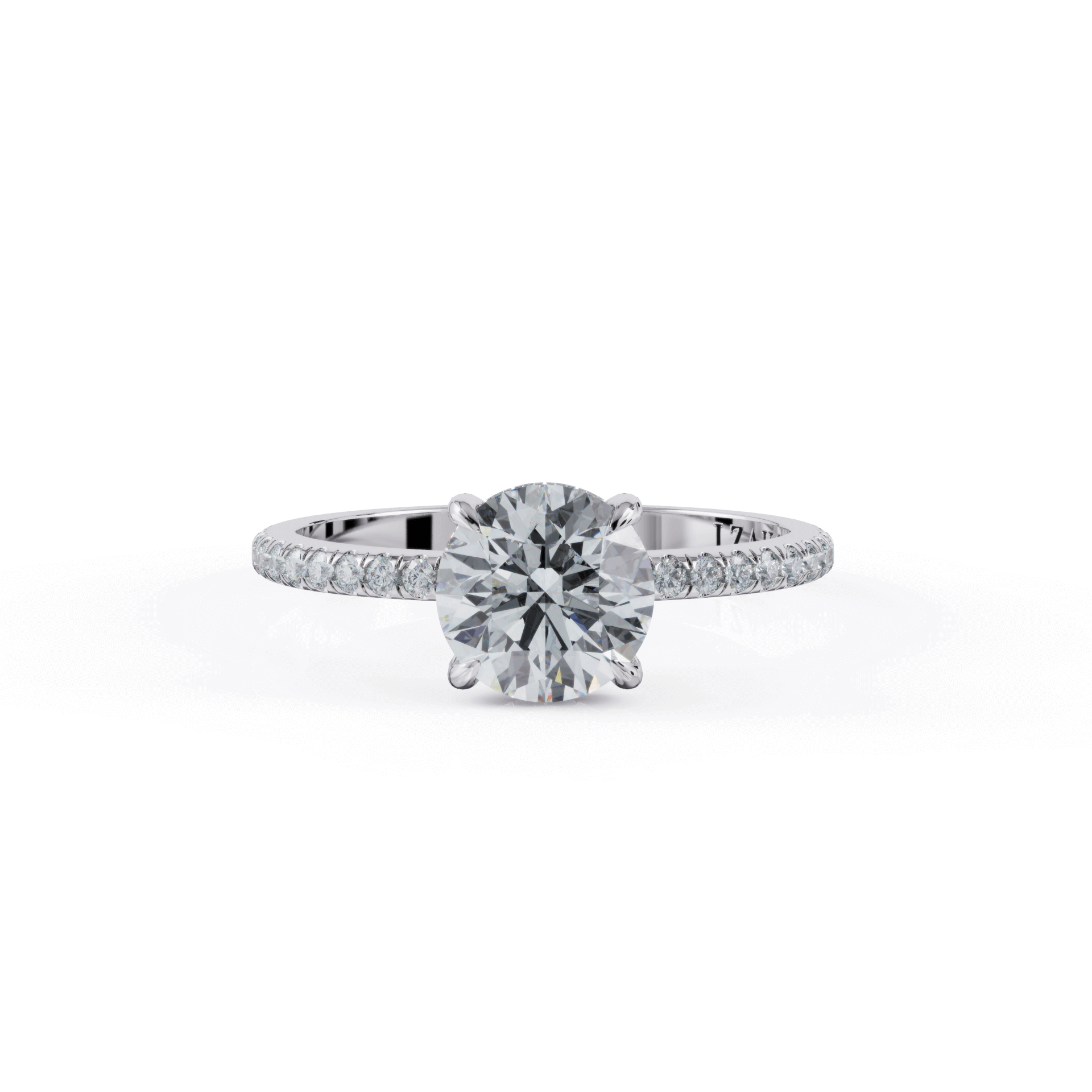 Elegant diamond engagement ring with a round brilliant-cut center stone and a delicate pave band from our jewelry collection.