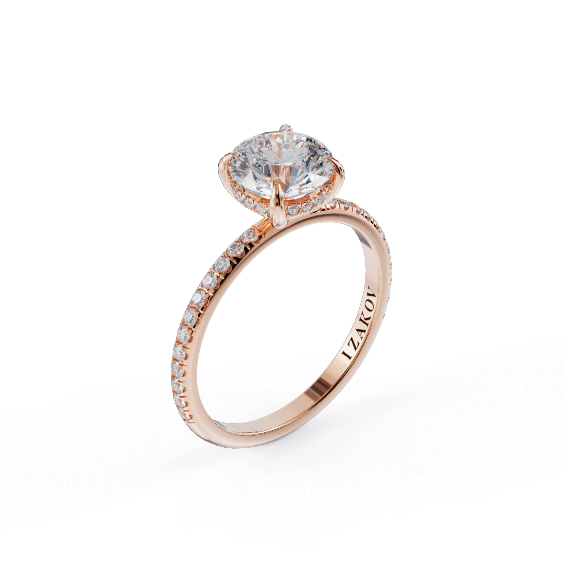 "Elegant rose gold engagement ring with a sparkling round diamond, surrounded by smaller diamonds on the band – IZAKOV Jewelry Collection"