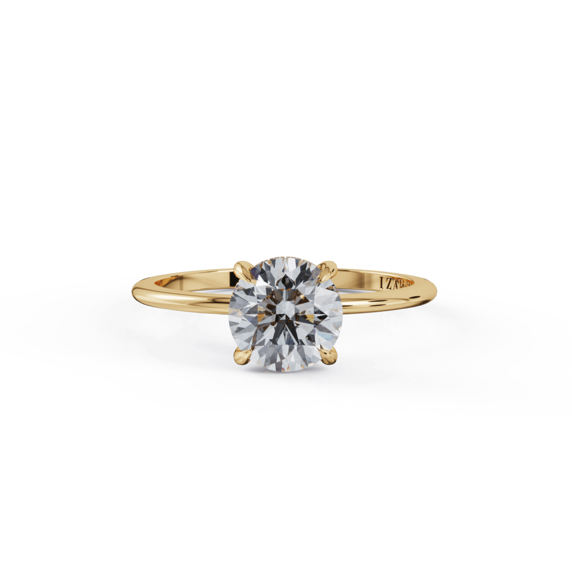 Gold engagement ring with round diamond centerpiece from our luxury jewelry collection.