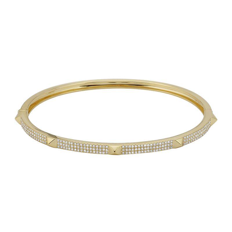 Gold bangle bracelet with intricate diamond detailing from our luxurious jewelry collection.