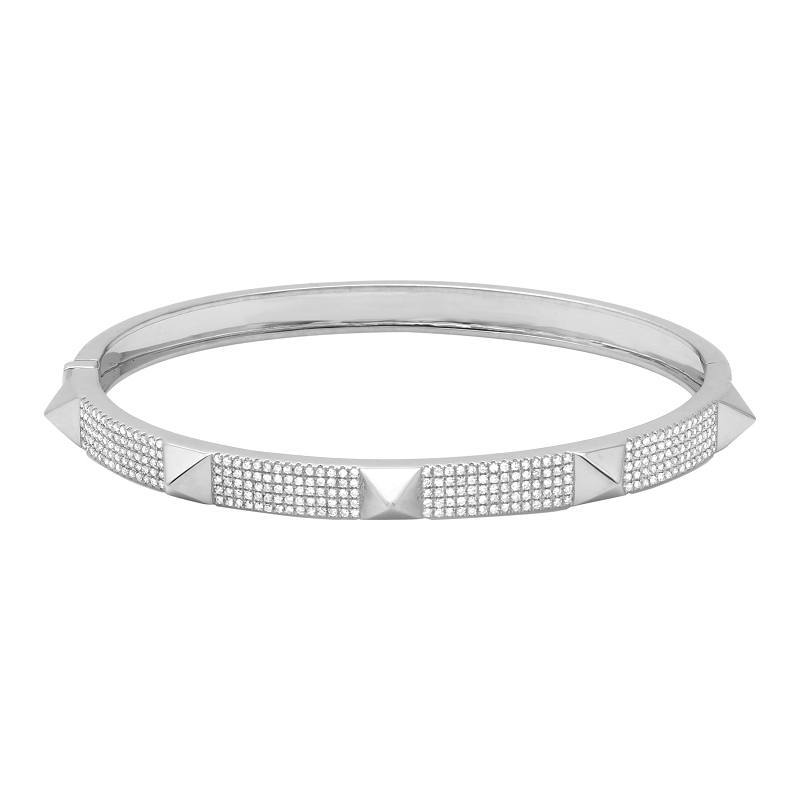 Sleek silver bangle bracelet with delicate diamond detailing from our luxurious jewelry collection.