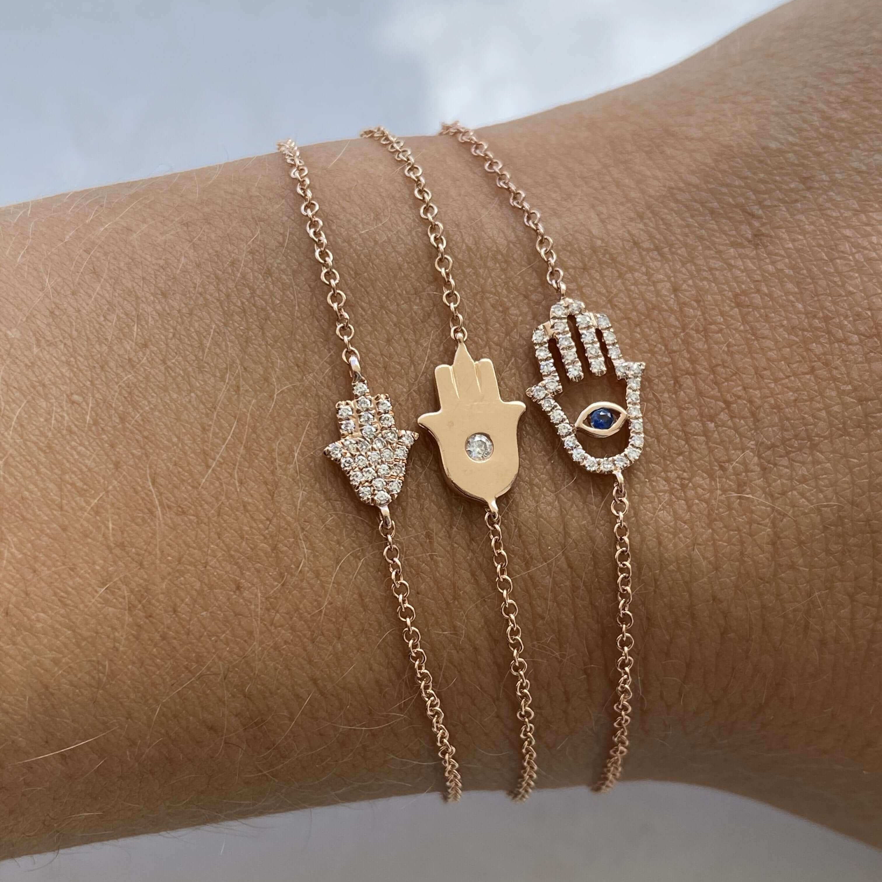 Elegant Hamsa hand bracelets with diamonds and enamel accents from our jewelry brand collection. Perfect for daily wear and gifting.