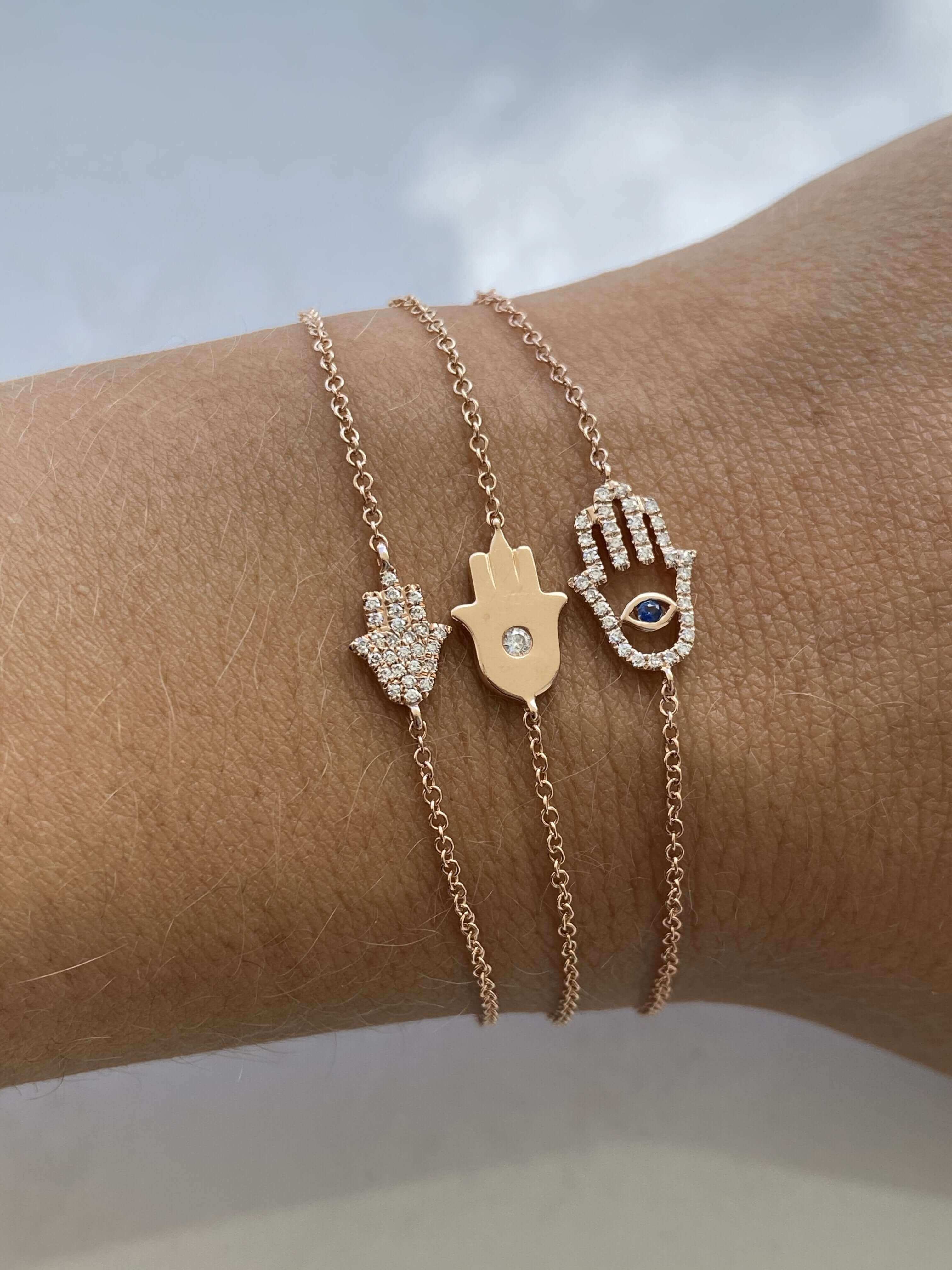 Elegant Hamsa hand bracelets with diamonds and enamel accents from our jewelry brand collection. Perfect for daily wear and gifting.