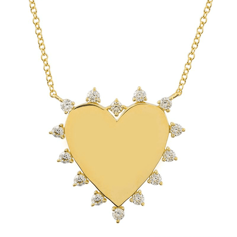 Gold heart pendant necklace with diamond accents from our luxury jewelry collection
